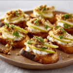 Ricotta Pear Crostini with Nut Topping